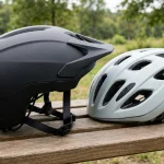 E-bike helmet next to a regular bike helmet showing the difference