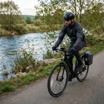 Speed pedelec rider wearing a certified helmet on a fast commuter route